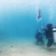 60 Penyelam Gelar Upacara Pengibaran Merah Putih di Dasar Laut Kolaka Utara Bersama Wagub Sultra